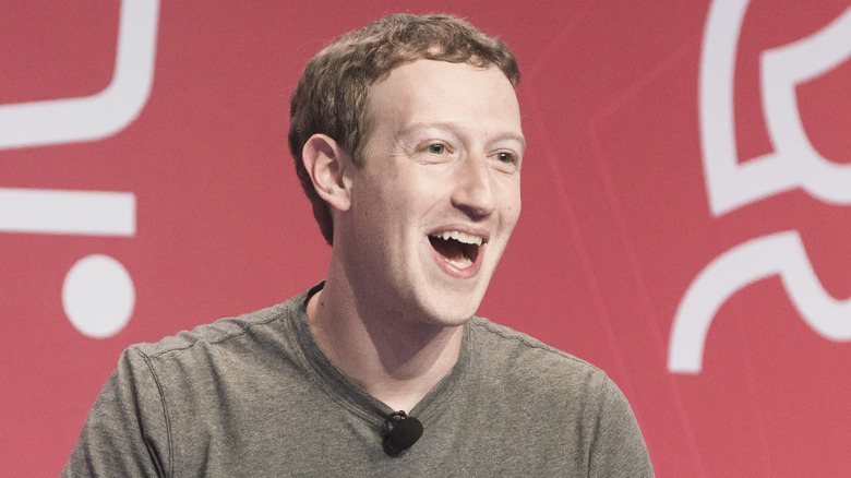 Mark Zuckerberg laughing on stage