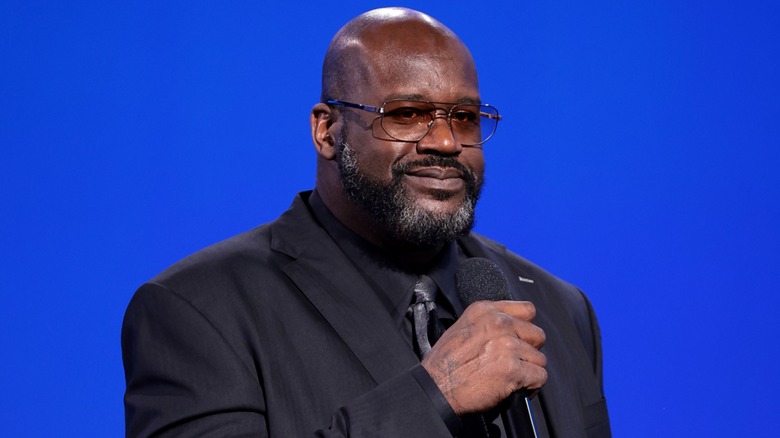Shaquille O'Neal speaking on stage