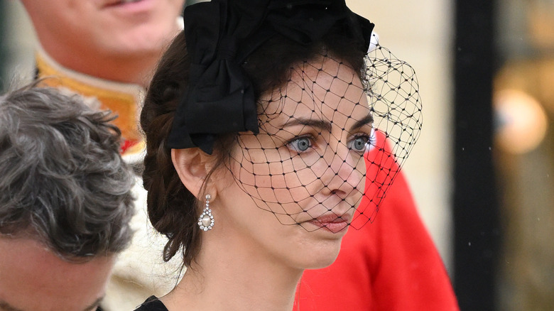 Rose Hanbury looking serious behind veil in close-up