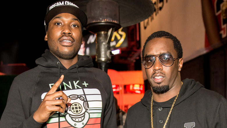 Meek Mill posuing with Diddy