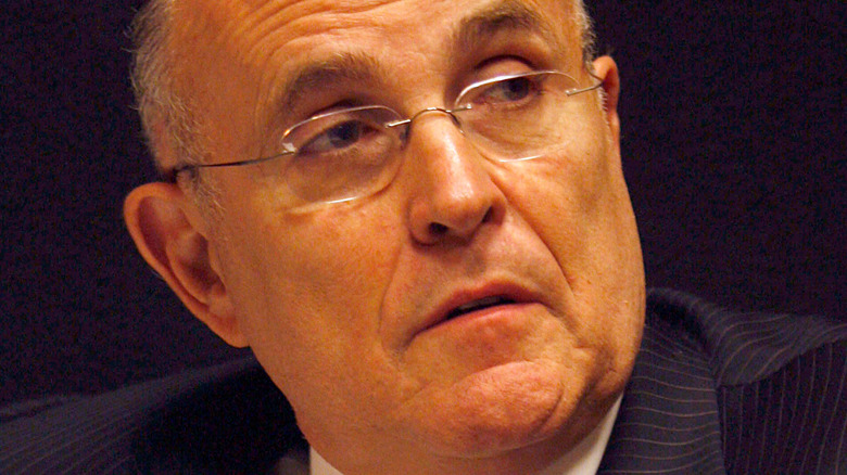 Rudy Giuliani with a neutral expression