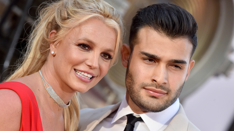 Britney Spears and Sam Asghari smiling