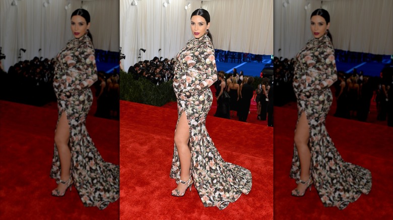 Kim Kardashian wearing a a floral dress at the 2013 Met Gala