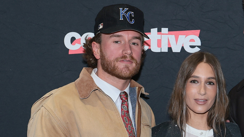 West Wilson Amanda Batula pose on red carpet