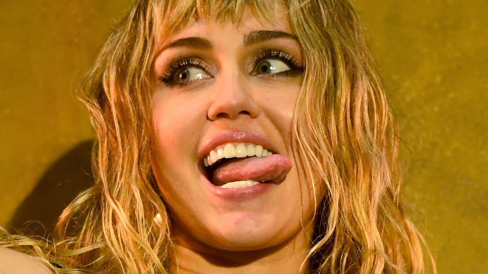 Miley Cyrus sticking out her tongue 