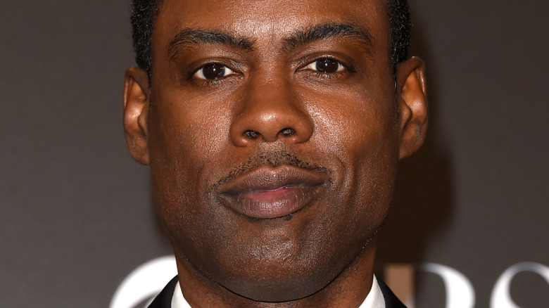 Chris Rock smiling at the Oscars