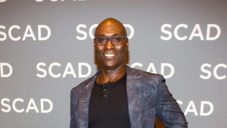 Lance Reddick poses 