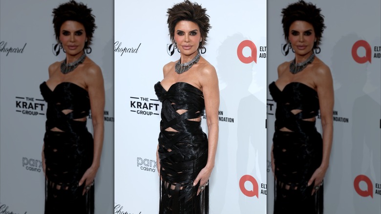 Lisa Rinna wearing a dress made from hair at an Oscars viewing party.