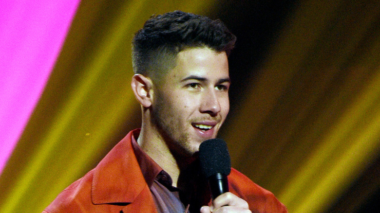 Nick Jonas with microphone