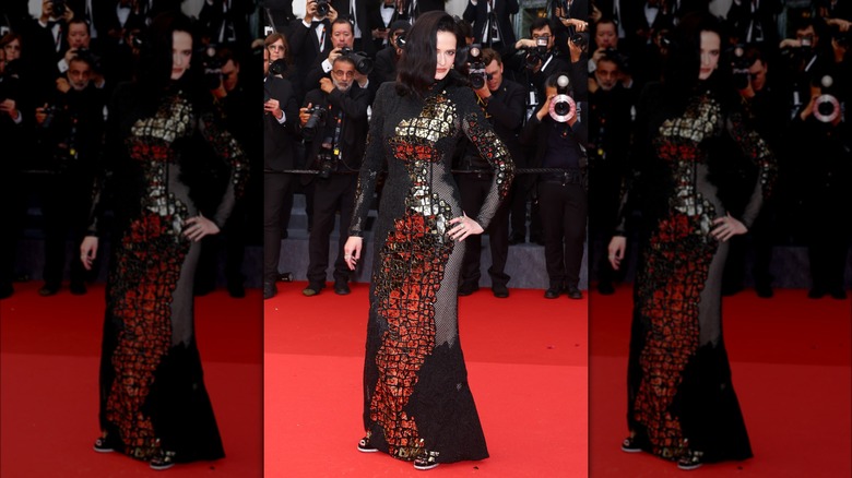 Eva Green wearing gold and black dress