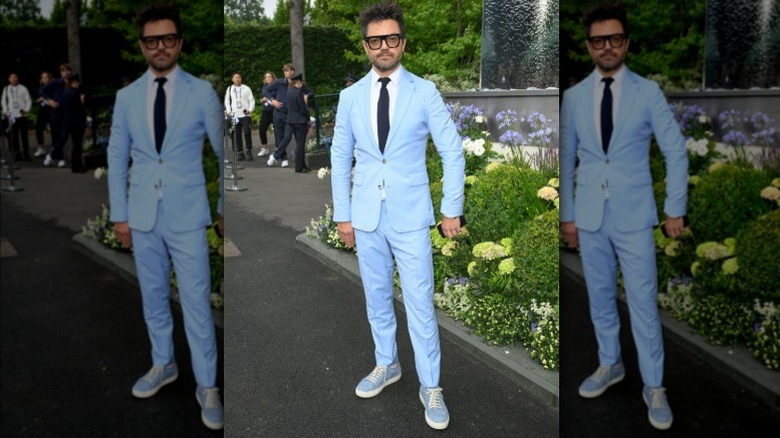 Dominic Cooper wearing a blue suit at Wimbledon 2025