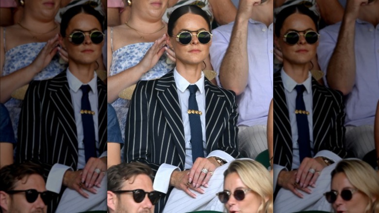 Jade Holland Cooper wearing sunglasses and a pinstripe blazer at Wimbledon 2025