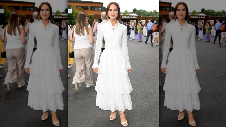 Maude Apatow wearing a white lace dress at Wimbledon 2025