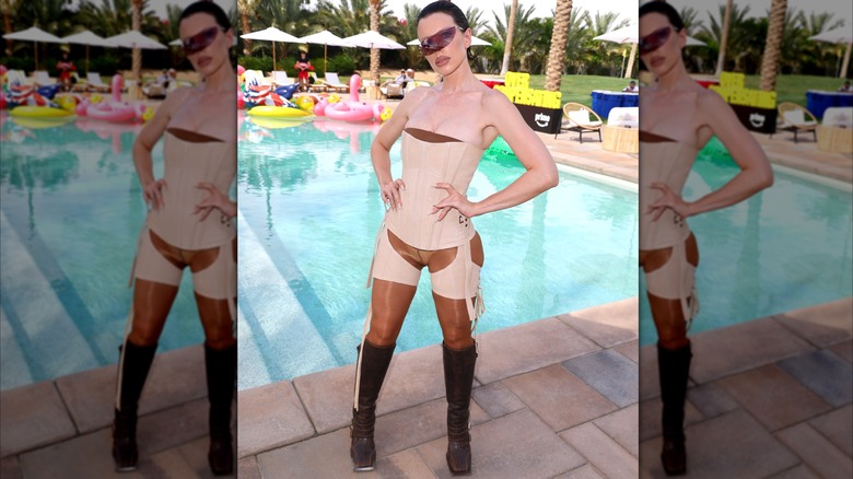 Julia Fox in corset and see through body suit