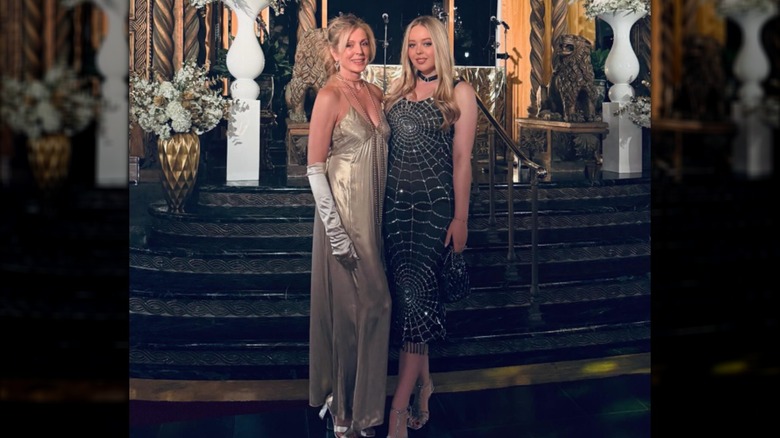 Marla Maples and Tiffany Trump posing at the Mar-a-Lago Gatsby party.
