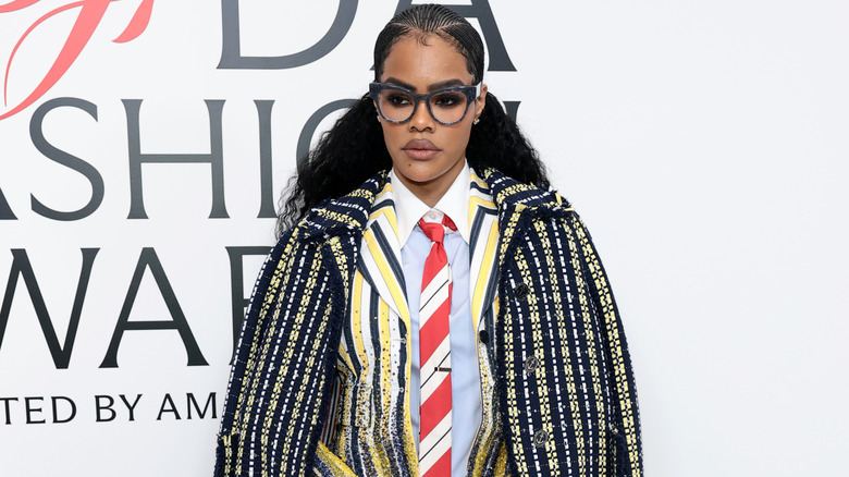 Teyana Taylor in a colorful suit