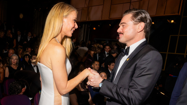 Gwyneth Paltrow greets Leonardo DiCaprio at the 2026 Oscars