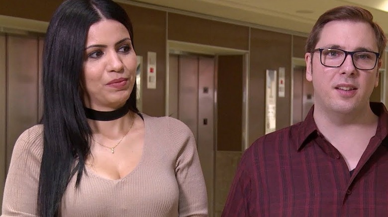 Colt and Larissa talking to cameras on 90 Day Fiance
