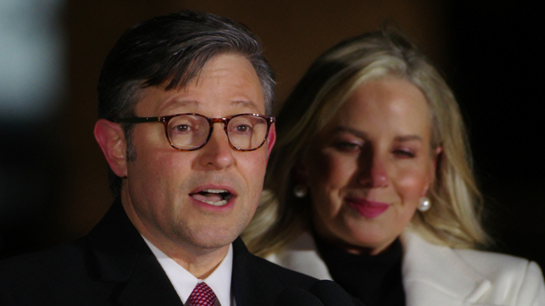 Mike Johnson (R-La.) speaks at the lighting of the Capitol Christmas Tree alongside his wife, Kelly Johnson.