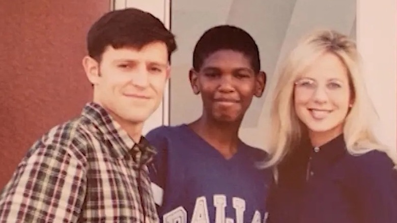Mike Johnson, his adopted Black son Michael Tirrell James, and Kelly Johnson