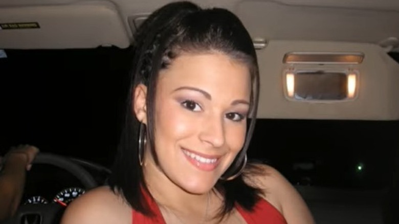 Bunz smiling in a car
