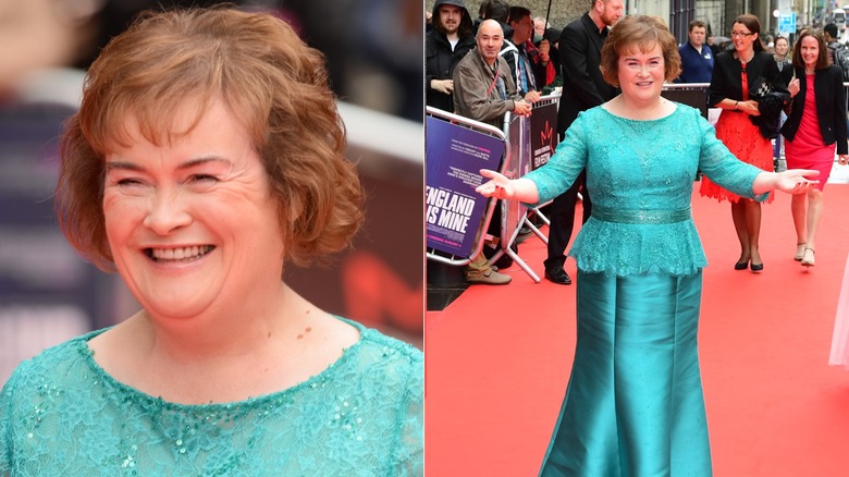 Susan Boyle posing on the red carpet in a turquoise gown.