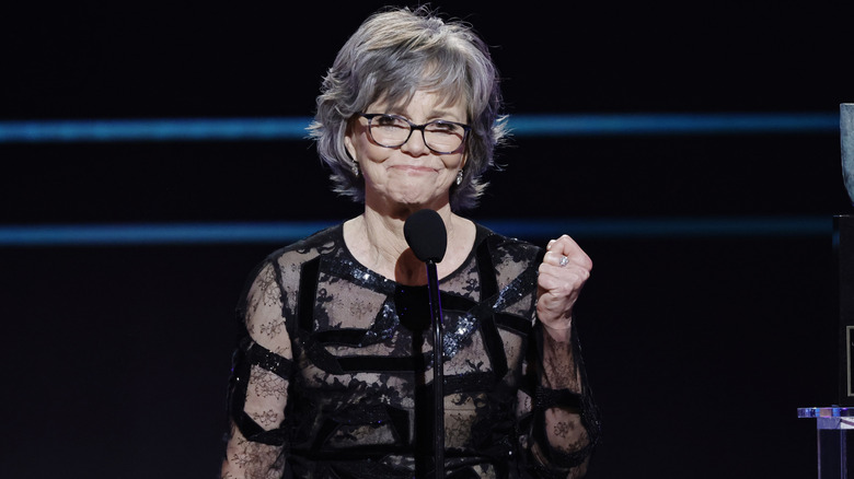 Sally Field making a fist while accepting her Life Achievement Award in 2023.