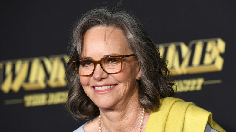 Sally Field wearing a pearl necklace on the red carpet in 2022.
