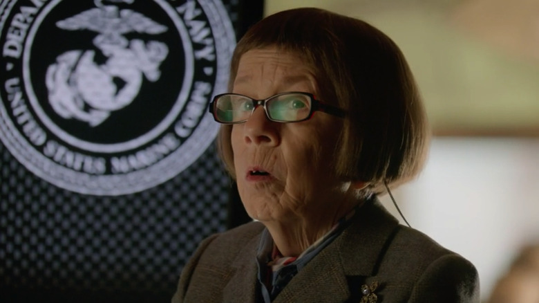 Linda Hunt, as Henrietta "Hetty " Lange on "Scorpion," speaks while standing with a slight turn.
