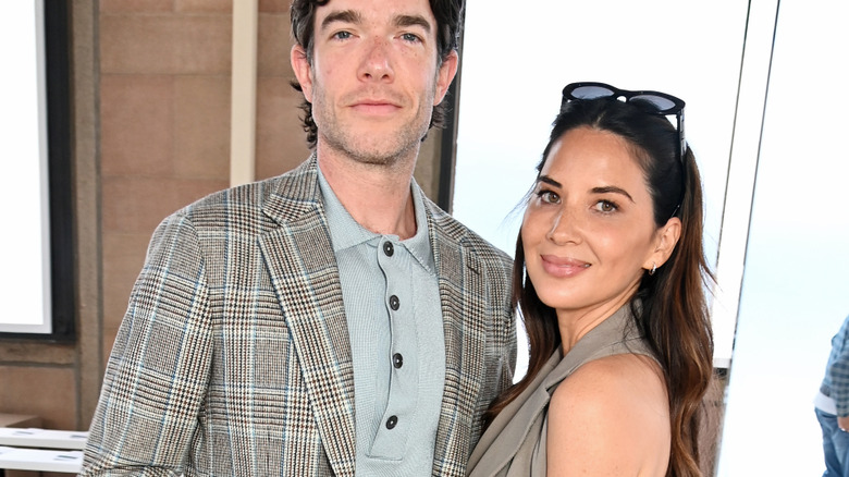 John Mulaney and Olivia Munn smiling