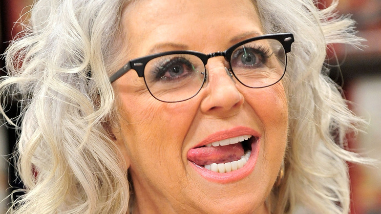 Paula Deen biting her tongue