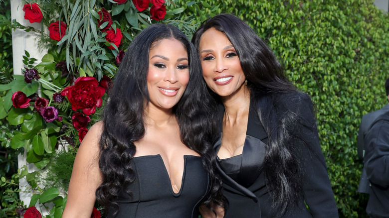 Beverly Johnson and Anansa Sims pose together in black