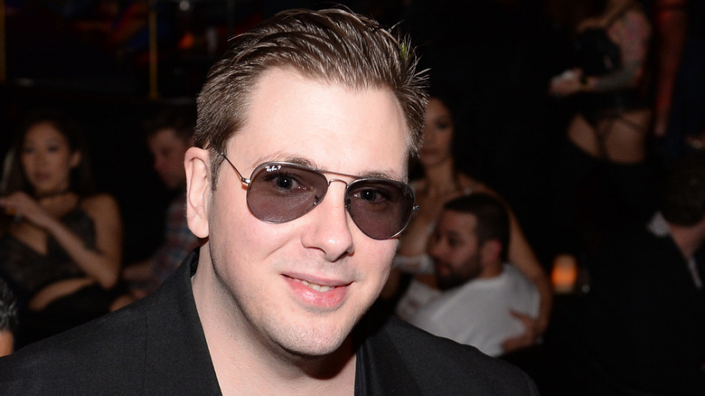 Colt Johnson wears black and sunglasses