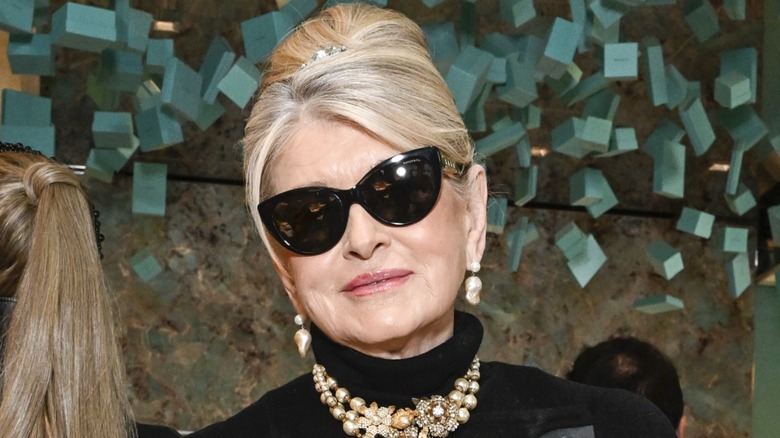 Martha Stewart posing in a Breakfast at Tiffany's-inspired outfit.