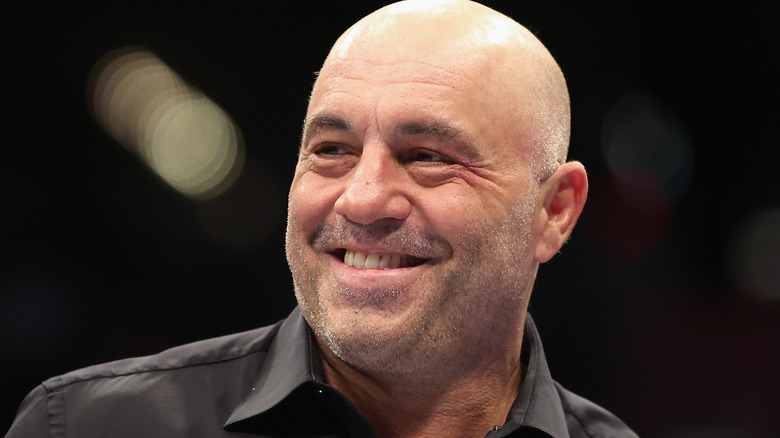 Joe Rogan smiling in black shirt