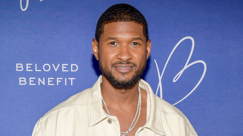 Usher Raymond wearing white