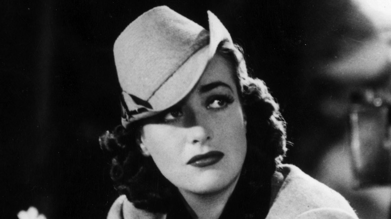 Joan Crawford posing