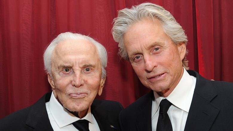 Kirk Douglas and Michael Douglas posing