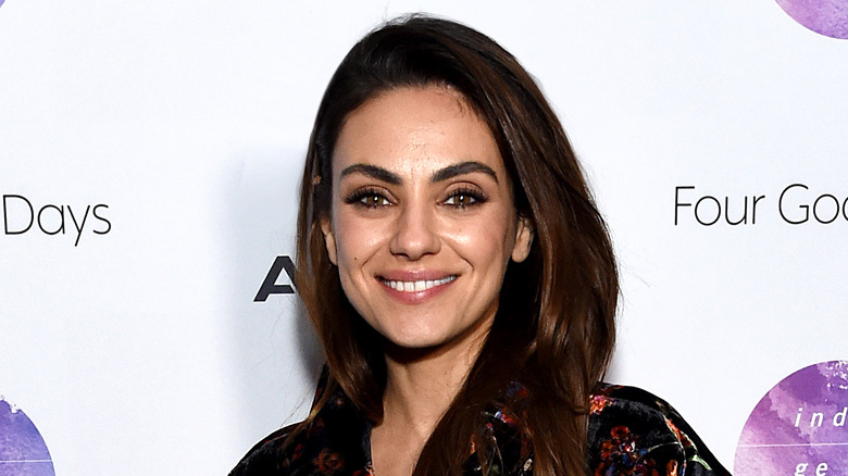 Mila Kunis smiling