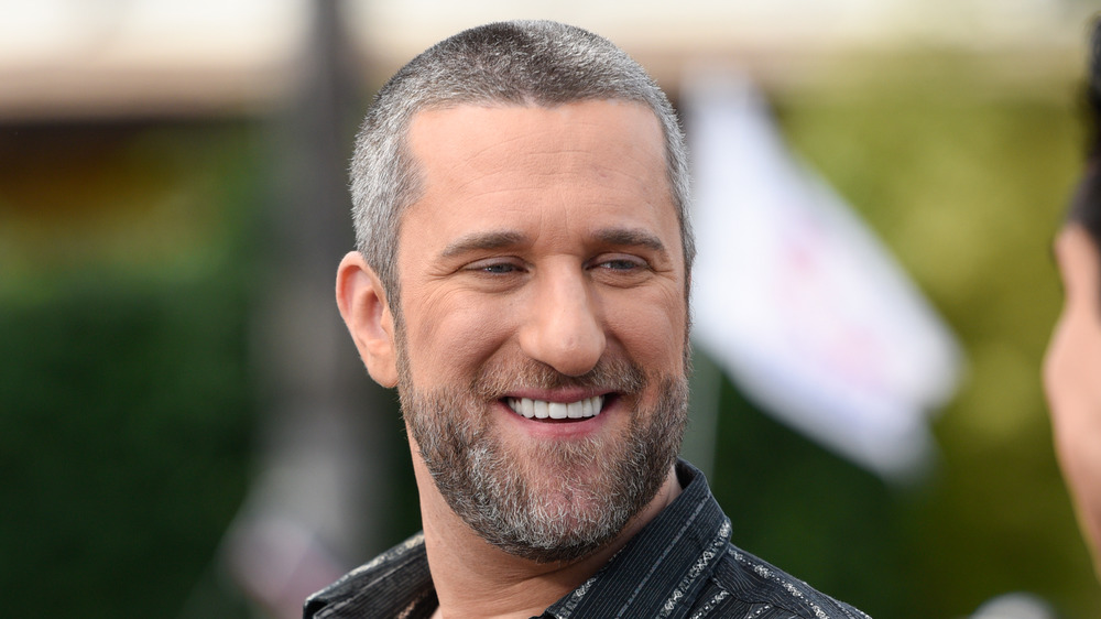 Dustin Diamond smiling with a beard