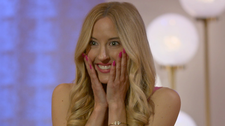 Chelsea smiling with shocked hands on her face on "Love is Blind"