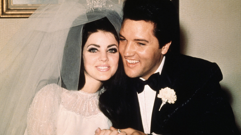 Priscilla and Elvis Presley on their wedding day