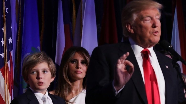 Barron Trump and Melania Trump watching Donald Trump speak