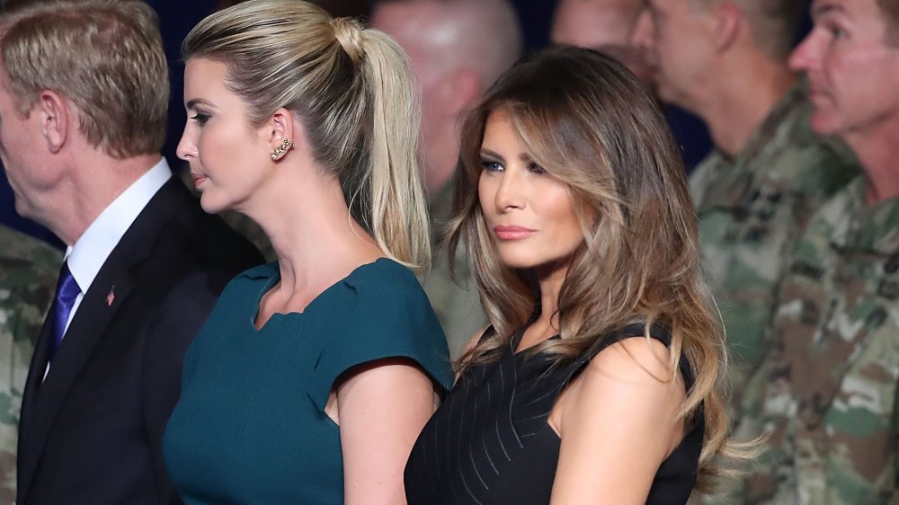 Ivanka Trump and Melania Trump standing next to one another