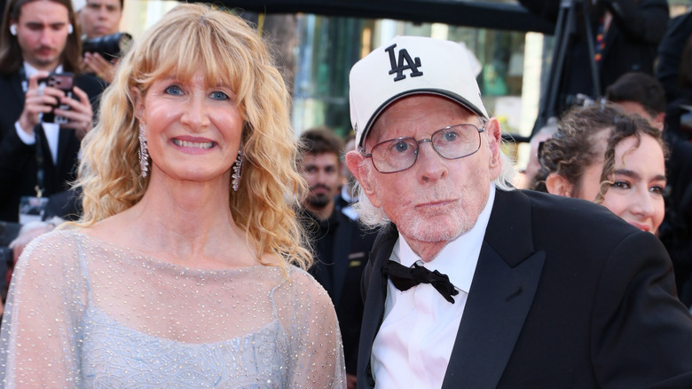 Bruce and Laura Dern posing at the 2026 Cannes Film Festival in their finery