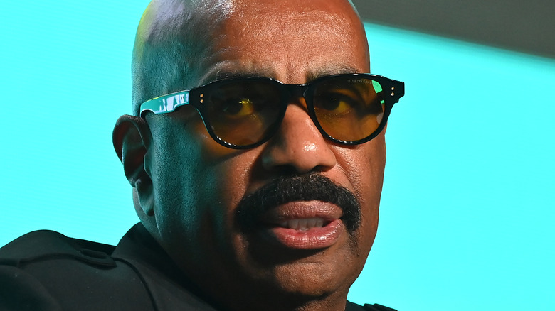 Steve Harvey speaking at an event