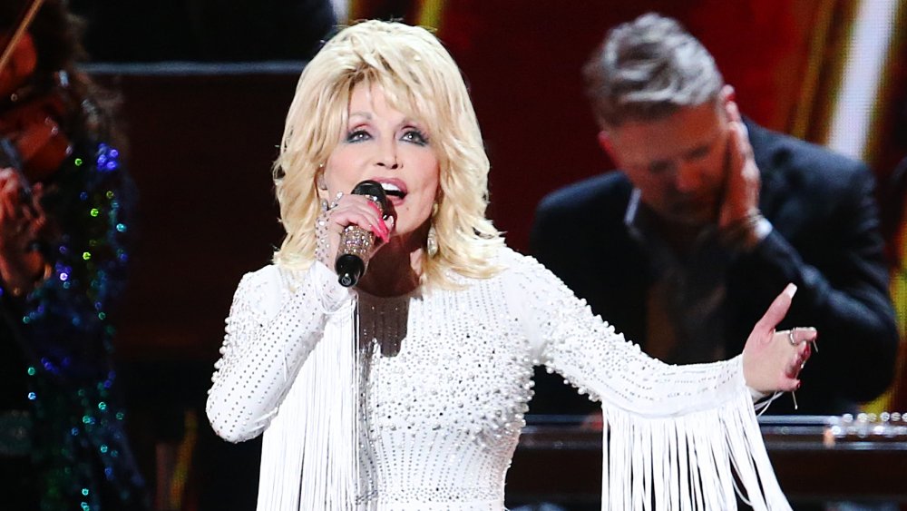 Dolly Parton performs onstage during the 53rd annual CMA Awards