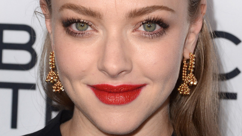 Amanda Seyfried sports red lipstick on the red carpet