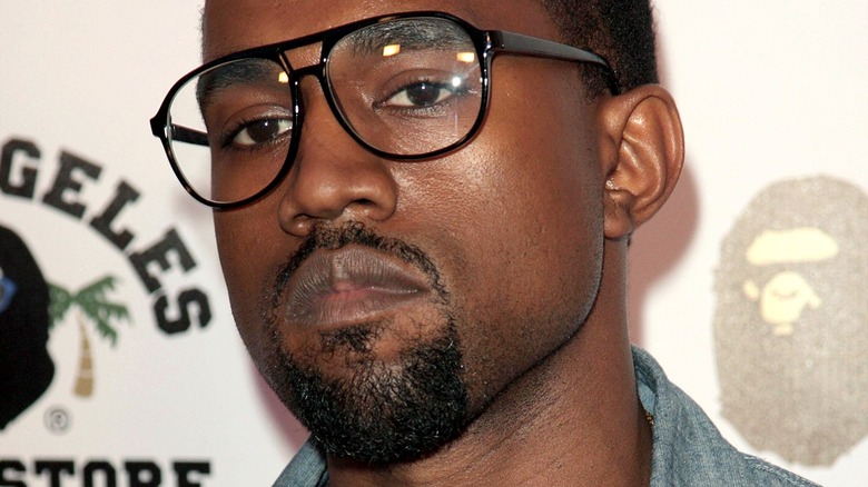 Kanye West stonefaced in glasses 