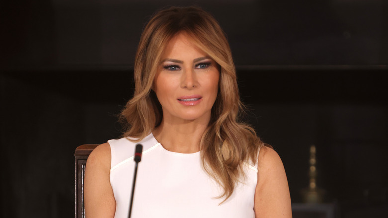 Melania Trump speaking at microphone